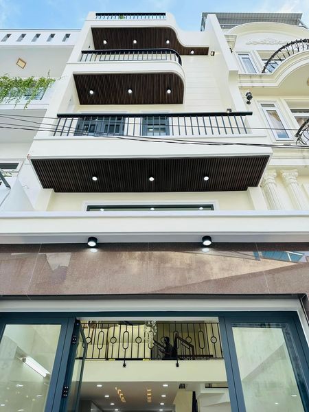 Nhà 4 tầng, ngang 4.5m, mặt tiền đường Út Tịch, 7Tỷ Ít
