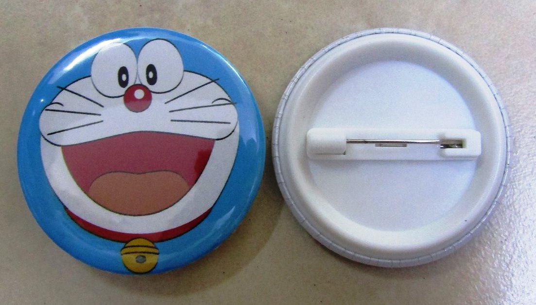 Huy hiệu nhựa tròn có sẵn in ấn quảng cáo theo yêu cầu